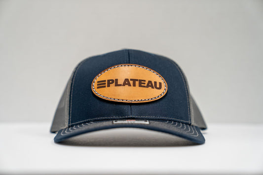 PLATEAU RICHARDSON 112 NAVY & CHARCOAL LEATHER PATCH TRUCKER